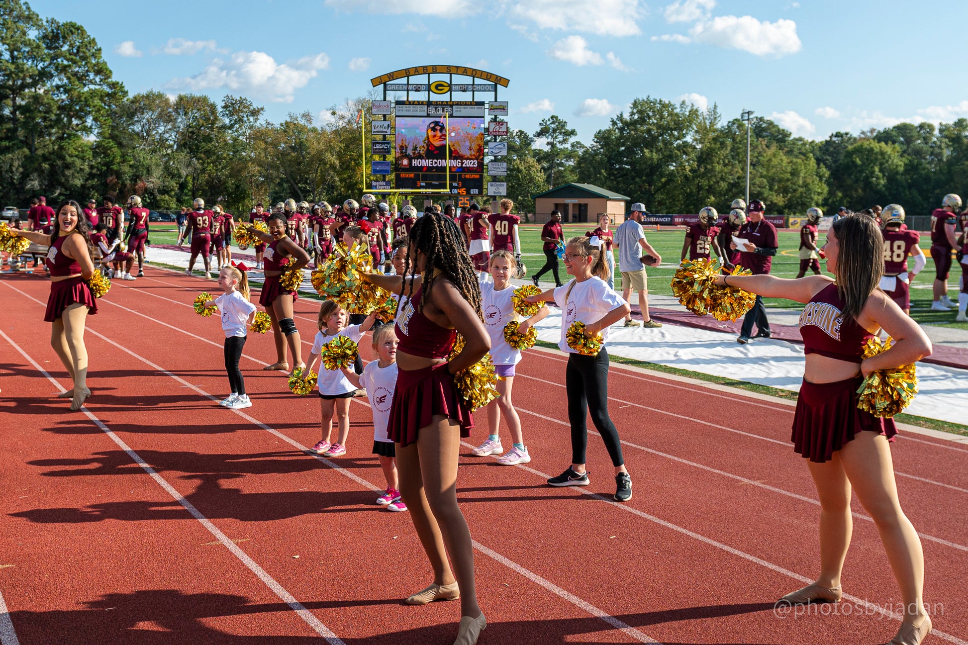 Erskine cheer team members perform alongside young Fleet fans
