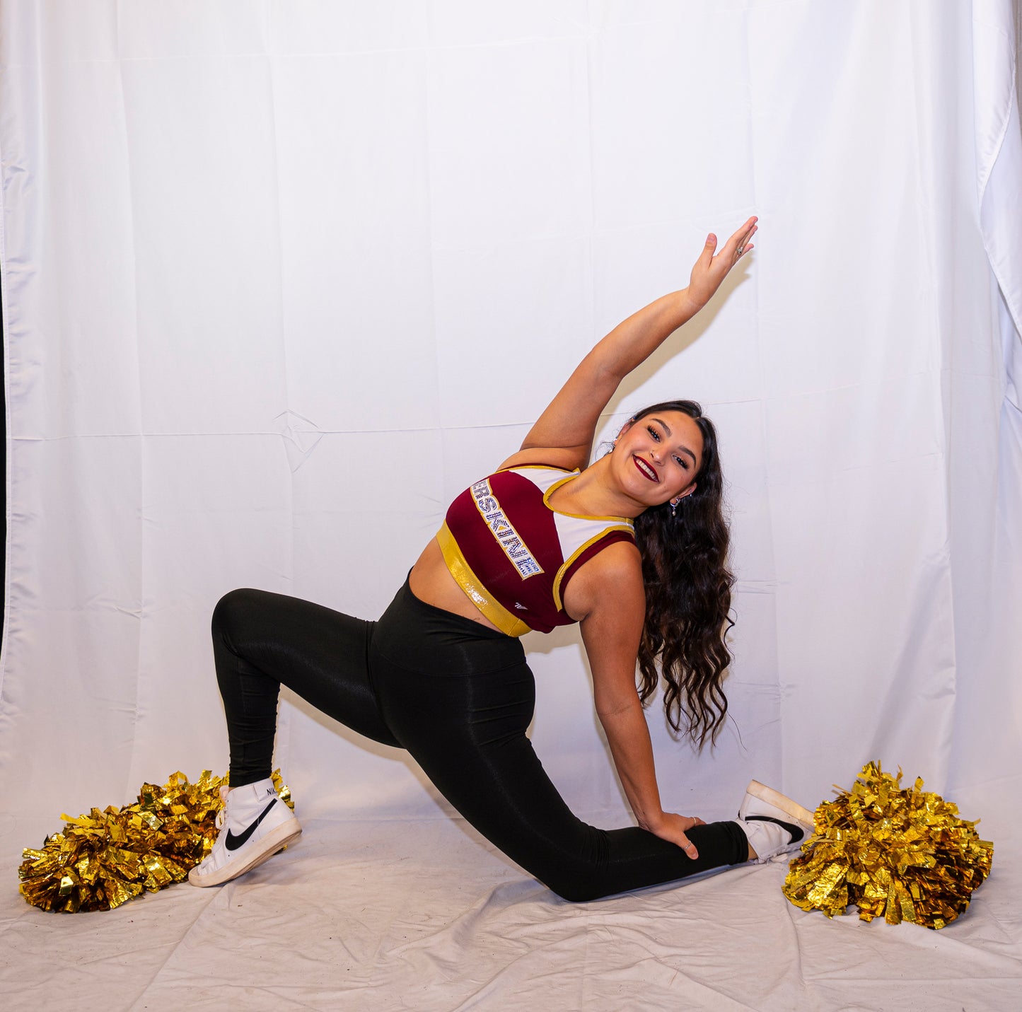 A member of Fleet Cheer poses
